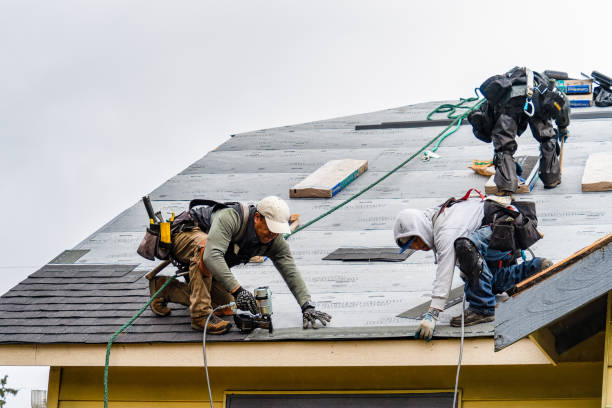 Professional Flat Roof Repair technician working in Pennville, PA